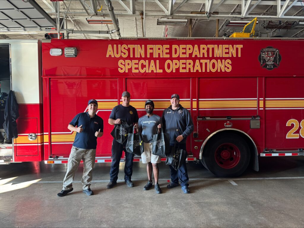 Professional plumbers assisting Austin Fire Department with plumbing repairs and maintenance work