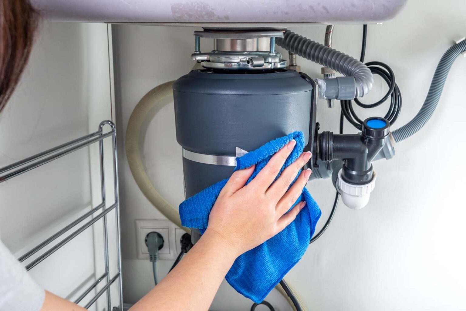 Garbage disposal unit installed under a kitchen sink