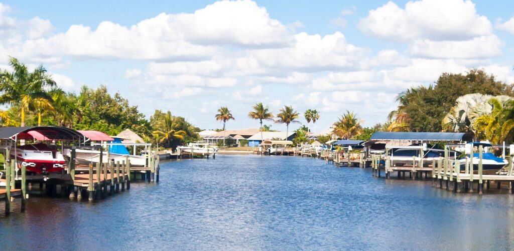 Waterfront homes and boat docks along a canal