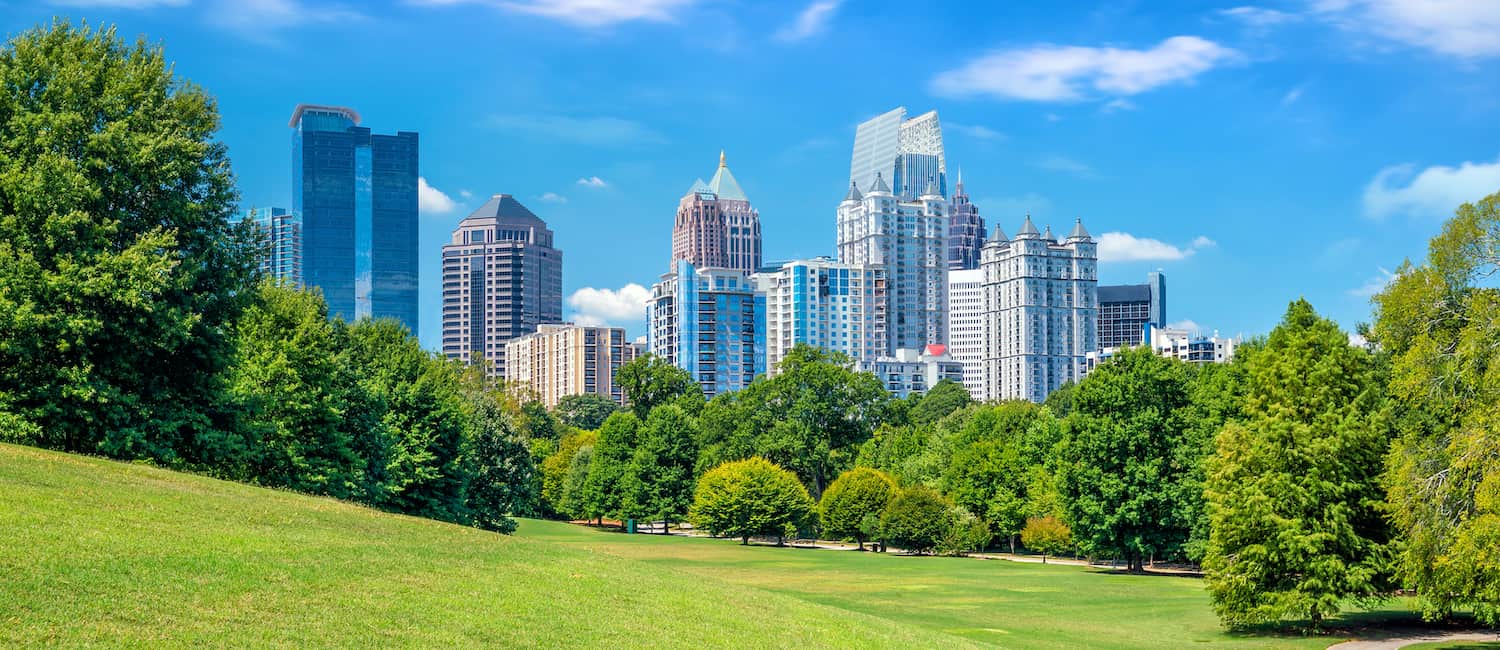 Midtown Atlanta skyline behind a green park