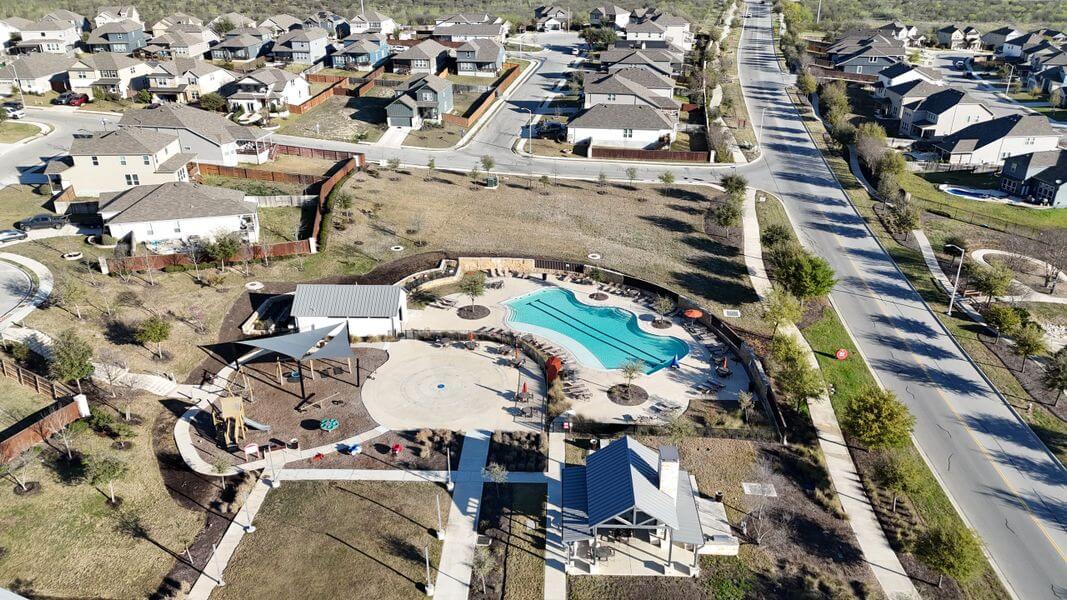 Aerial view of a Schertz neighborhood with a community pool