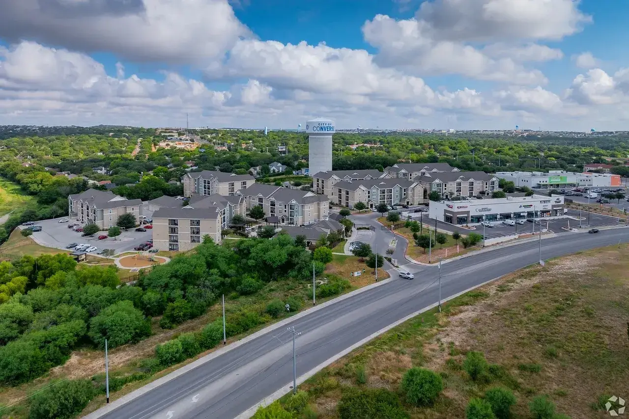 Aerial view of Converse with a water tower and apartments