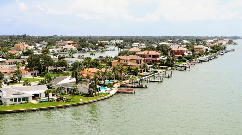 Waterfront homes and boat docks along a canal