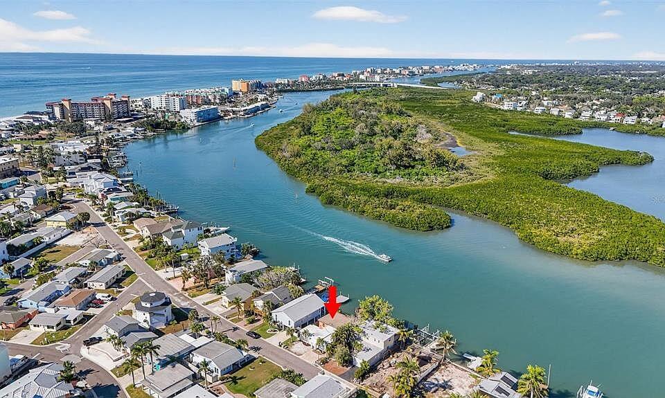 Aerial view of a waterway, mangrove islands and waterfront homes on the Florida Gulf Coast