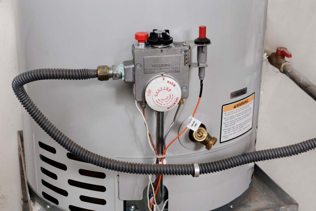 Gas control valve and thermostat on a tank water heater